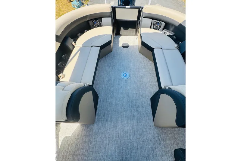 Slide: The Image of Interior of 2026 Berkshire 24 RFX CTS pontoon boat with spacious seating and modern design. - 10