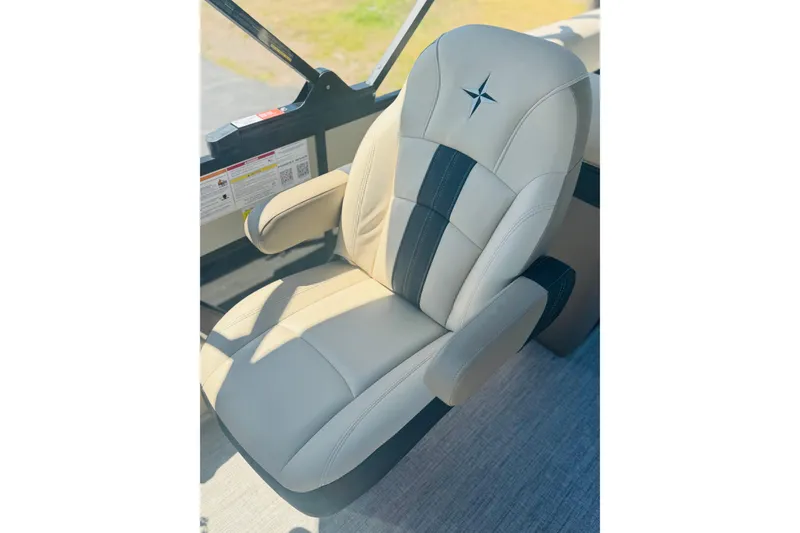 Slide: The Image of Luxurious beige and black captain's chair in 2026 Berkshire 24 RFX CTS boat. - 11