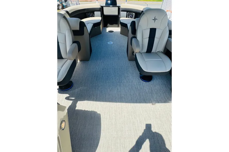Slide: The Image of Interior of 2026 Berkshire 24 RFX CTS pontoon boat with plush seating and modern design. - 9