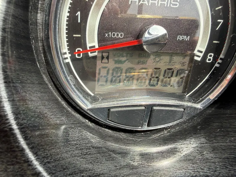 Slide: The Image of Tachometer of a 2021 Harris Sunliner 230, displaying 0 RPM. - 14