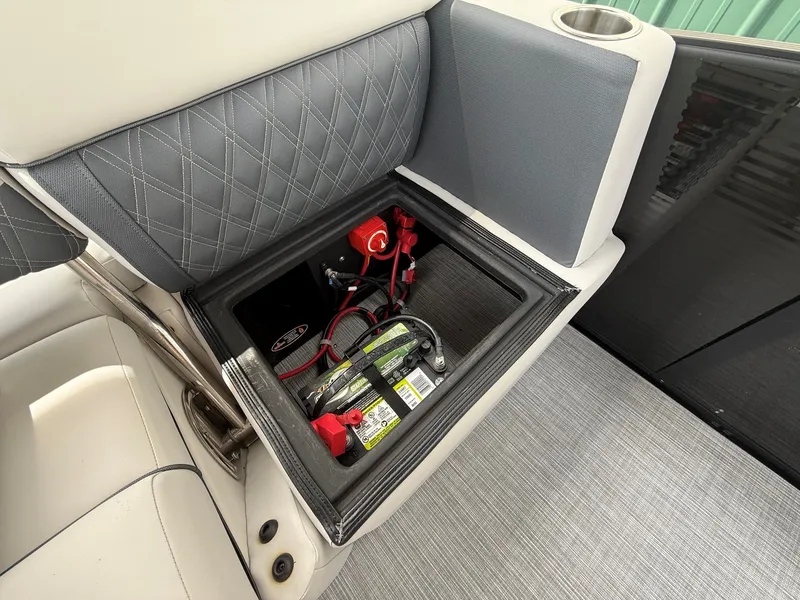 Slide: The Image of Battery compartment in Harris Sunliner 230 pontoon boat, year 2021. - 19