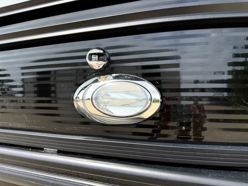Slide: The Image of Close-up of a 2021 Harris Sunliner 230 boat component. - 2