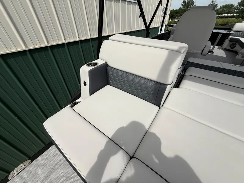 Slide: The Image of Harris Sunliner 230 2021, luxurious white seating with cup holders. - 24