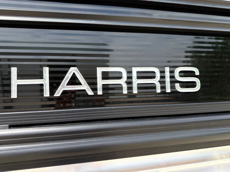 Slide: The Image of Close-up of Harris Sunliner 230 logo, year 2021. - 4