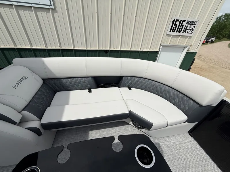 Slide: The Image of Interior of a 2021 Harris Sunliner 230 with gray upholstery. - 8