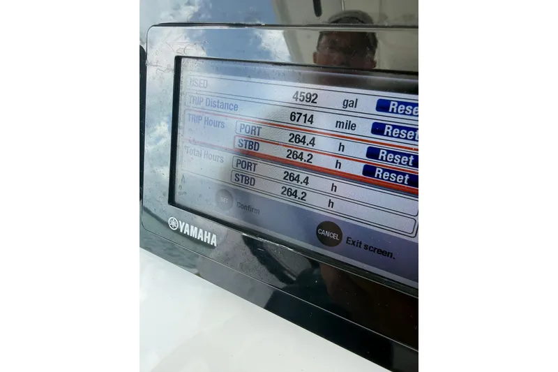 Slide: The Image of Yamaha display showing trip data on 2018 Edgewater 320CC boat. - 31