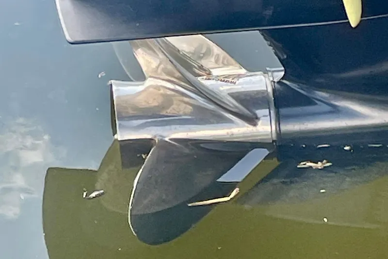 Slide: The Image of Close-up of a 2015 Glasstream 228 TE boat propeller in water. - 3