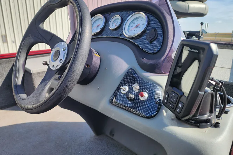 Slide: The Image of Steering console of 2018 Tracker Pro 170 boat with gauges and Garmin device. - 11