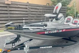 Slide: The Image of 2016 Tracker Pro Team 175 TXW boat on trailer, parked outdoors. - 15
