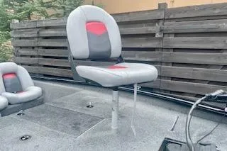 Slide: The Image of 2016 Tracker Pro Team 175 TXW boat with gray and red seating. - 8