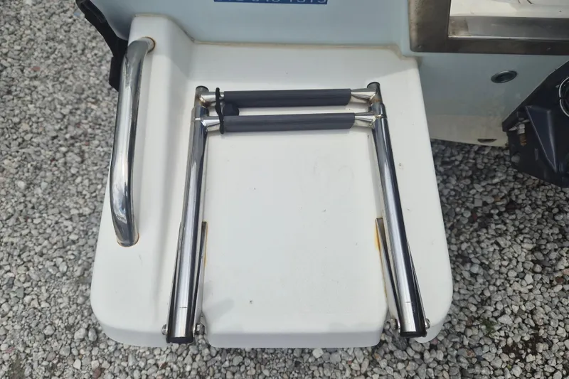 Slide: The Image of Stainless steel boat ladder on a 2021 Key West 1720 Center Console. - 5