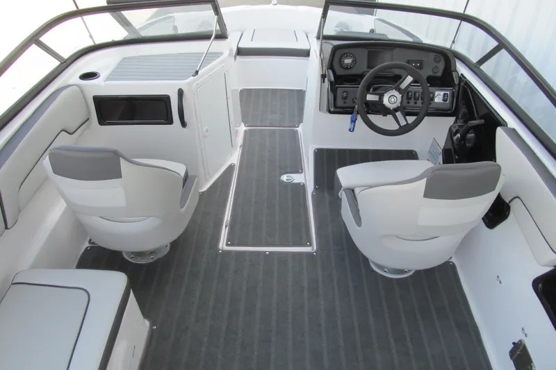 Slide: The Image of 2024 Yamaha Boats SX190 interior with dual seats and modern dashboard. - 5