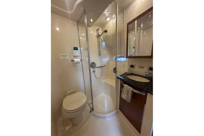Slide: The Image of Luxurious bathroom in 2004 Sea Ray 390 Motor Yacht with shower and vanity. - 11