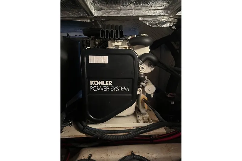 Slide: The Image of Kohler power system in 2004 Sea Ray 390 Motor Yacht engine room. - 16