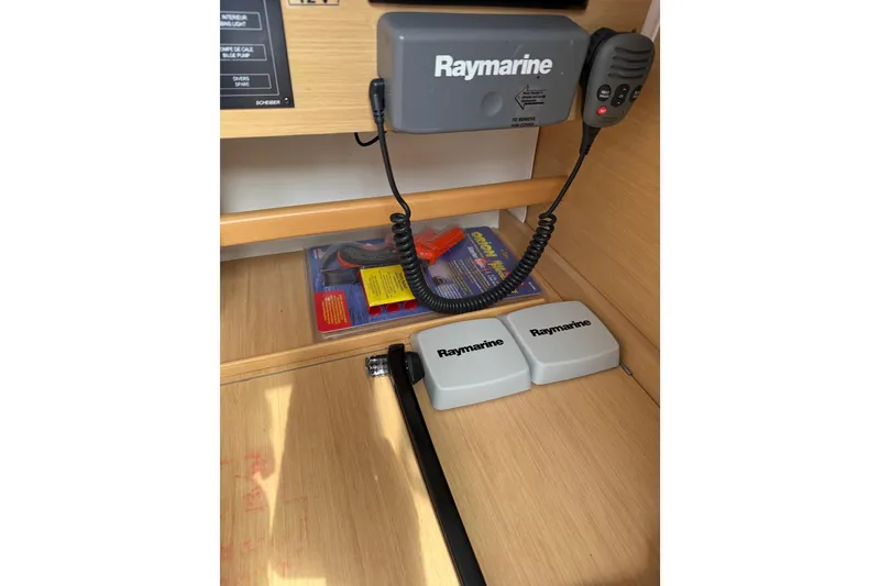 Slide: The Image of Raymarine equipment inside a 2014 Beneteau FIRST 25 S sailboat cabin. - 23