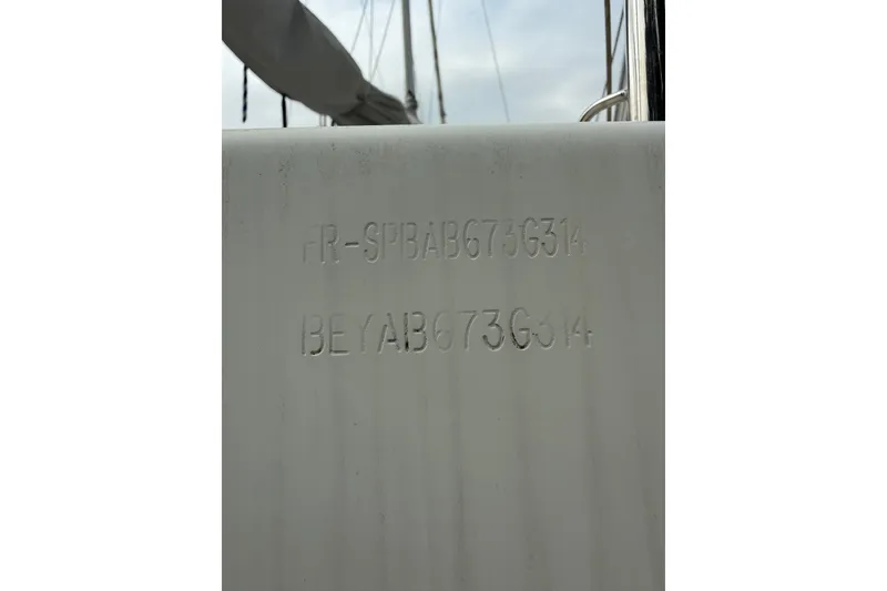 Slide: The Image of Hull identification number on a 2014 Beneteau FIRST 25 S sailboat. - 40