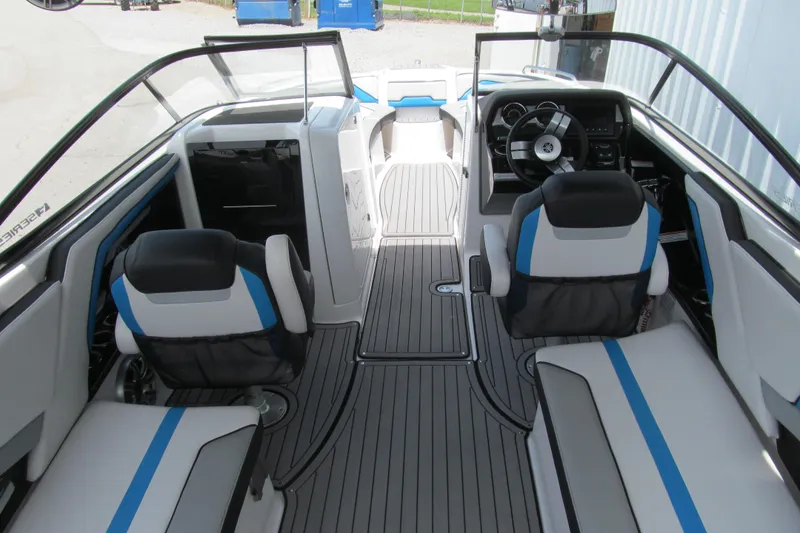 Slide: The Image of 2017 Yamaha Boats 242X E-Series interior with sleek seating and modern dashboard design. - 3