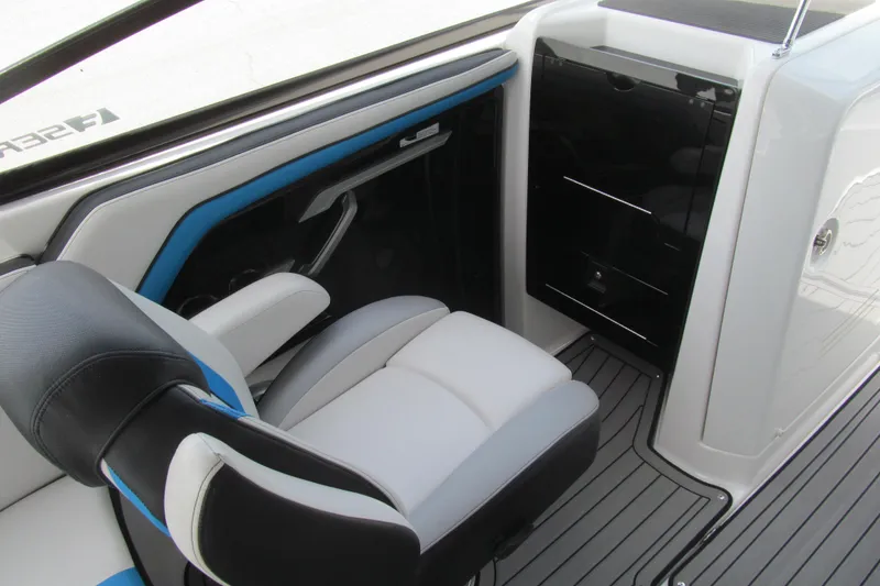 Slide: The Image of Interior of 2017 Yamaha Boats 242X E-Series, featuring sleek seating and modern design. - 5