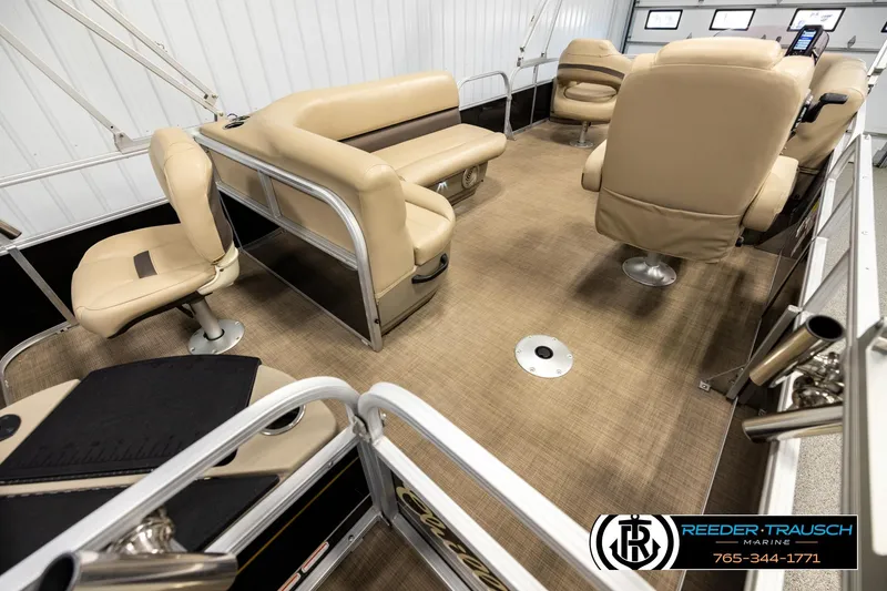Slide: The Image of Interior of 2022 SUNTRACKER BASS BUGGY 18 DLX pontoon boat with beige seating. - 12