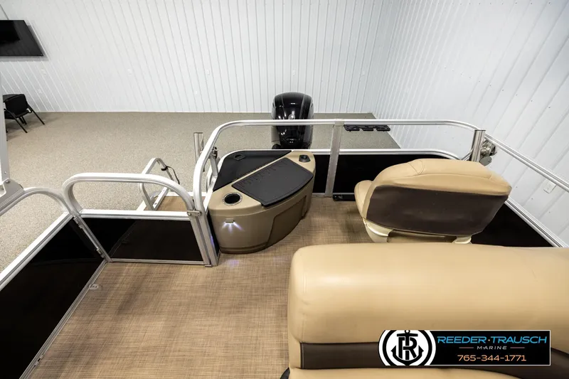 Slide: The Image of 2022 SUNTRACKER BASS BUGGY 18 DLX interior with seating and control panel. - 15