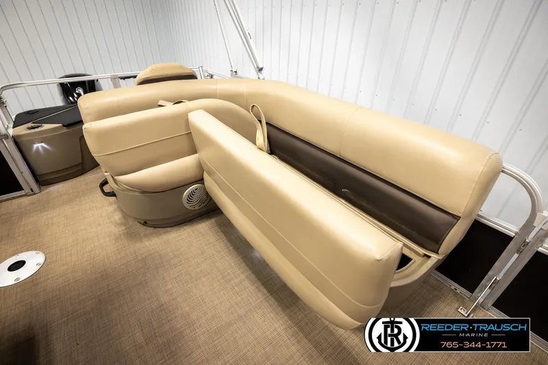 Slide: The Image of 2022 SUNTRACKER BASS BUGGY 18 DLX pontoon boat interior with beige seating. - 21