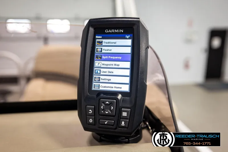 Slide: The Image of Garmin fishfinder on 2022 SUNTRACKER BASS BUGGY 18 DLX boat, displaying menu options. - 30