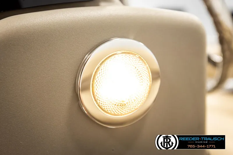 Slide: The Image of Close-up of a 2022 SUNTRACKER BASS BUGGY 18 DLX boat light fixture. - 35