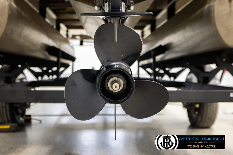 Slide: The Image of Propeller of 2022 SUNTRACKER BASS BUGGY 18 DLX pontoon boat on trailer. - 52
