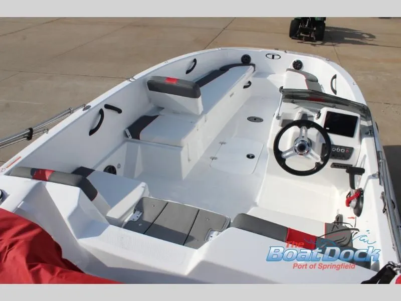 Slide: The Image of Interior view of T-Yachts 18, 2026 model, featuring steering console. - 10