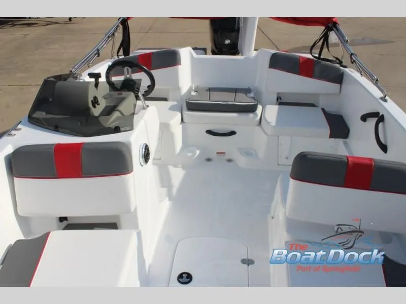 Slide: The Image of Interior of a 2026 T-Yachts 18 with gray and red seating. - 13