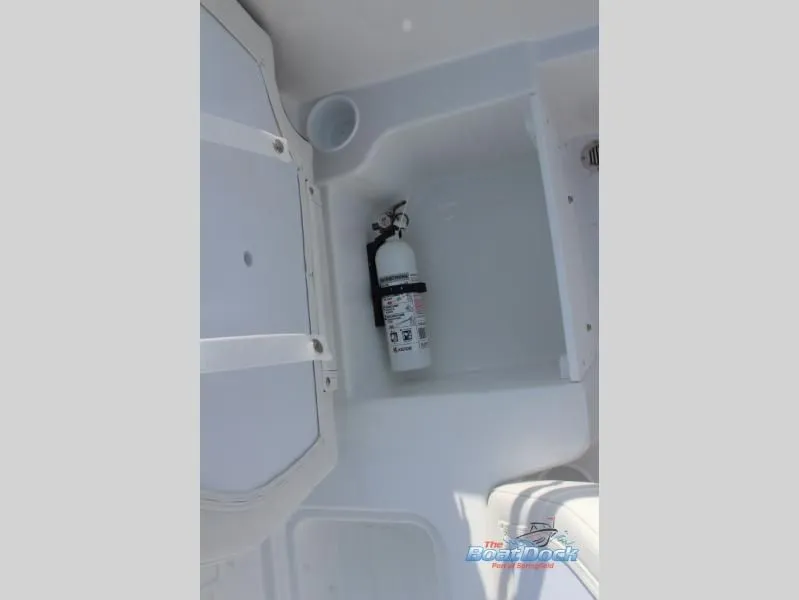 Slide: The Image of Interior of a 2026 T-Yachts 18 featuring a fire extinguisher. - 18