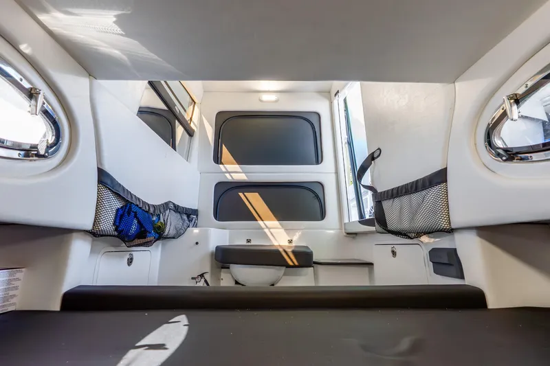 Slide: The Image of Interior of 2026 Nor-Tech 390 Sport Center Console boat, featuring modern design and storage. - 6