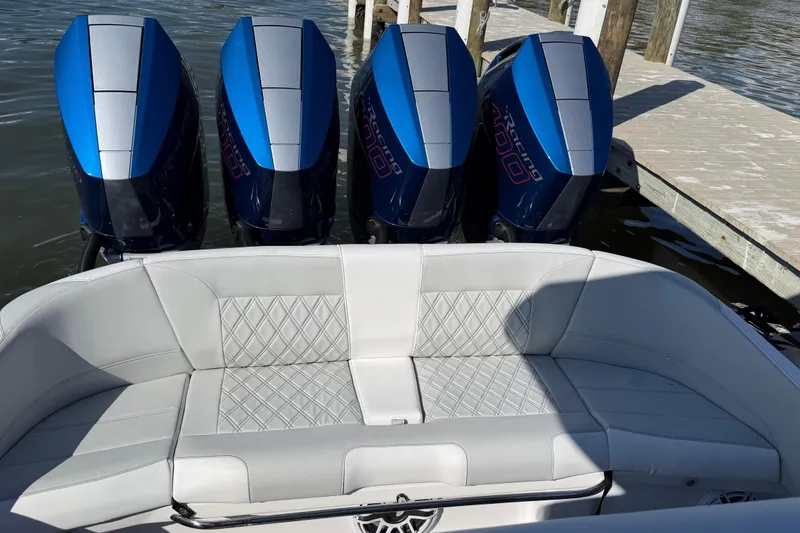 Slide: The Image of 2026 Nor-Tech 390 Sport Center Console with quad engines and luxurious seating. - 8
