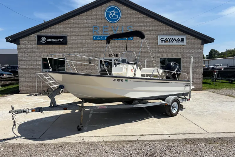The Image of 2012 Boston Whaler 170 Montauk boat on trailer outside dealership. - 0