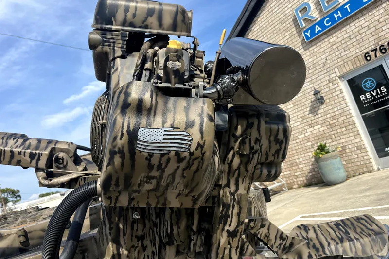 Slide: The Image of Camouflage-patterned engine of 2026 Excel 1754 Shallow Water F4 Pro Hull at Revis Yacht Sales. - 13