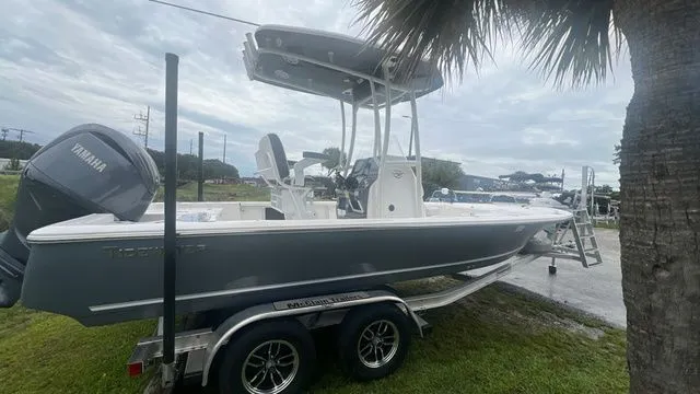 Slide: The Image of 2025 Tidewater 2110 Bay Max boat on trailer, side view. - 6