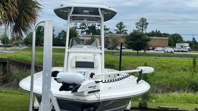 Slide: The Image of 2025 Tidewater 2110 Bay Max boat displayed on grass. - 8