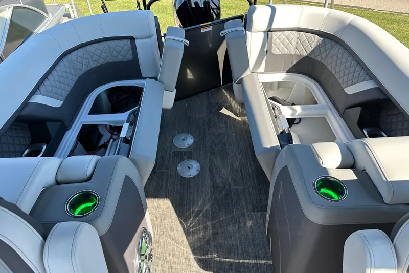 Slide: The Image of Luxurious interior of 2025 Godfrey AquaPatio 255 SB pontoon boat with plush seating. - 10