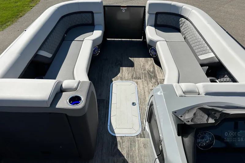 Slide: The Image of Luxurious interior of 2025 Godfrey AquaPatio 255 SB pontoon boat with plush seating. - 19