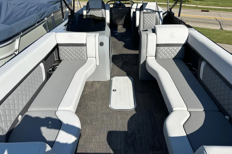 Slide: The Image of Luxurious interior of 2025 Godfrey AquaPatio 255 SB pontoon boat with elegant seating. - 20