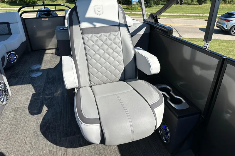 Slide: The Image of Luxurious seating on 2025 Godfrey AquaPatio 255 SB pontoon boat, featuring modern design and comfort. - 22