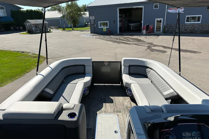 Slide: The Image of Interior view of 2025 Godfrey AquaPatio 255 SB pontoon boat with spacious seating. - 24