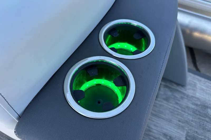 Slide: The Image of Illuminated cup holders on 2025 Godfrey AquaPatio 255 SB boat. - 8