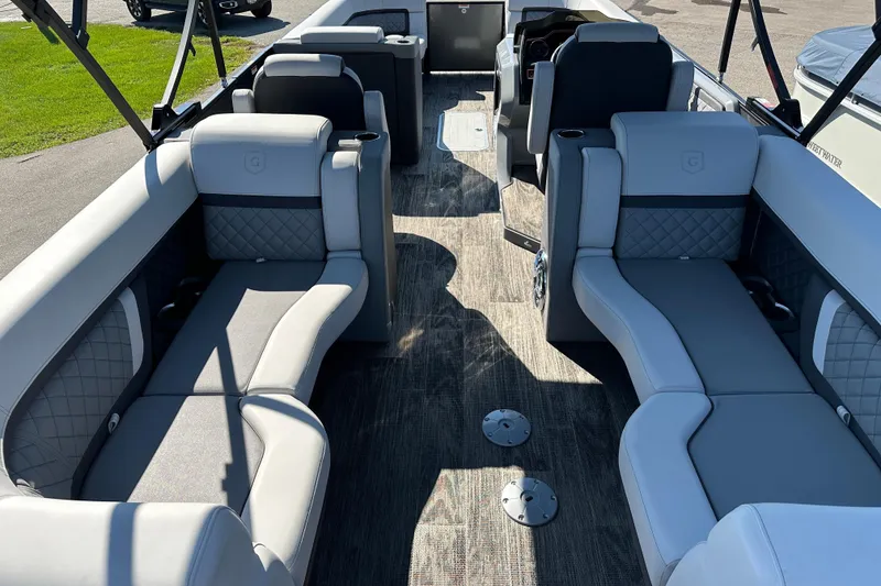 Slide: The Image of Luxurious interior of 2025 Godfrey AquaPatio 255 SB pontoon boat with plush seating. - 9