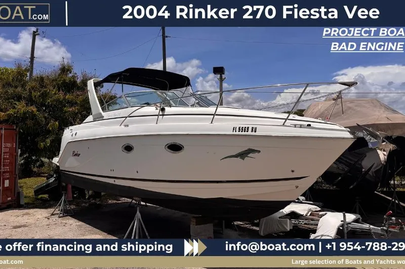 The Image of 2004 Rinker Fiesta Vee 270 boat on stands, labeled as project with bad engine. - 0