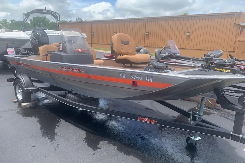 The Image of 2018 Tracker Bass Tracker 40th Anniversary Heritage Edition boat on trailer, parked outdoors. - 0