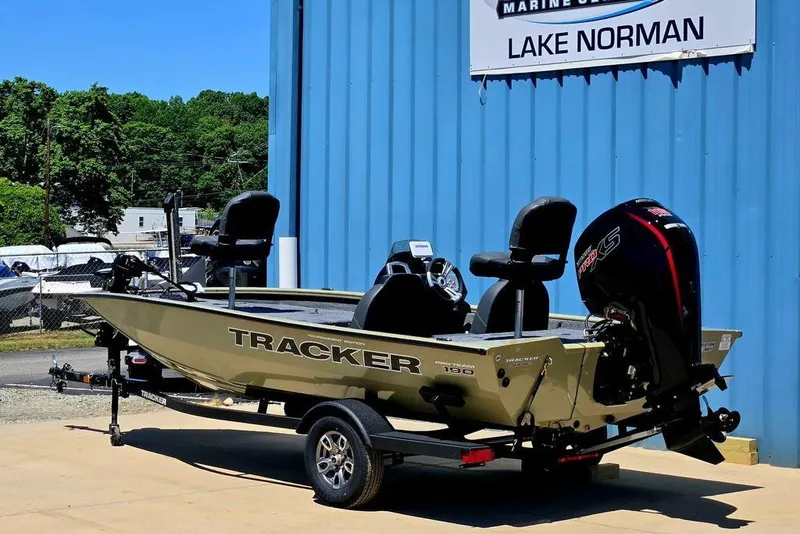 Slide: The Image of 2026 Tracker Pro Team 190 boat on trailer at Lake Norman dealership. - 2
