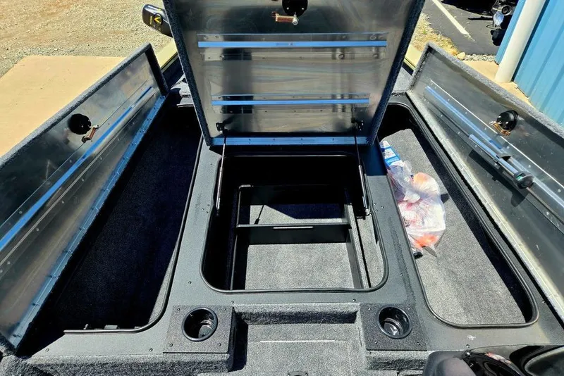 Slide: The Image of 2026 Tracker Pro Team 190 boat storage compartments open, revealing spacious interior. - 40
