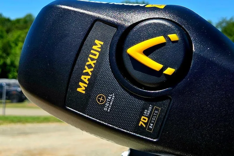 Slide: The Image of Close-up of Maxxum motor on 2026 Tracker Pro Team 190 boat, sunny day. - 8