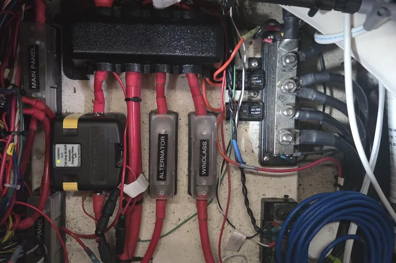 Slide: The Image of Electrical panel of a 1989 C&C 37/40+ sailboat with labeled wiring and components. - 21